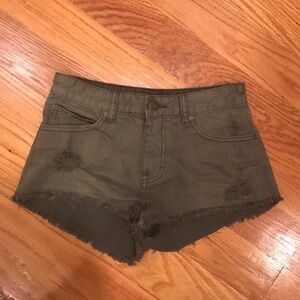 Women’s Billabong green jean shorts. Size 24.